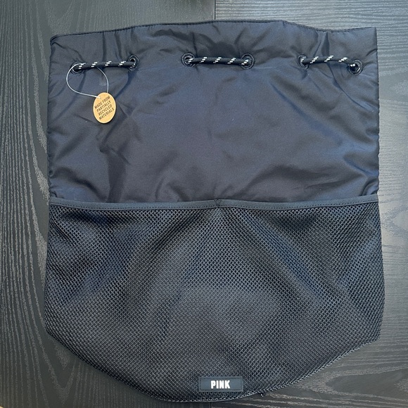 PINK Victoria's Secret Handbags - PINK Victoria's Secret Black Drawstring Bag 
15” across 
NWT 
Smoke free home